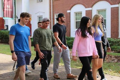 International students conversing on campus